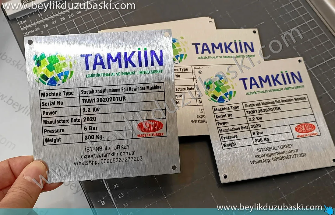 tamkiin makine etiketi, alüminyum makine tanıtım levhası, acil alüminyum levhalar hazırlanmaktadır, beylikdüzü acil metal plaka baskılari
