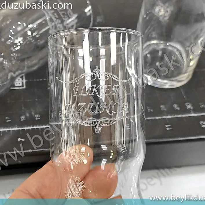Rakı bardağına baskı, lazer ile rakı bardağı baskısı, bekle al, ürün sizden, baskı bizden, az adet bardak baskıları yapılır, su bardağı, rakı bardağı, acil bardak baskısı, cam baskı, cama baskı, kazıma lazer cam baskı