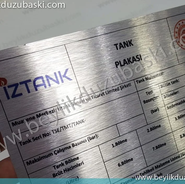 iztank metal plaka, iztank firması için yapılan metal plaka baskısı, kaliteli ve dayanıklı, metal plaka, üretimi yapılmaktadır, aynı gün üretilip gönderilir, acil metal plaka üretimi