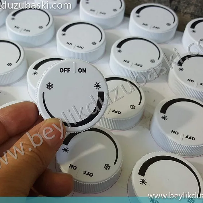 uv ile kapak baskısı, ürün kapak ve ayar düğmelerine, kalıcı baskı, uv baskı, lazer baskı, toplu baskı, numune baskı yapılır, beylikdüzü serigraf, tampon ve UV baskı merkezi