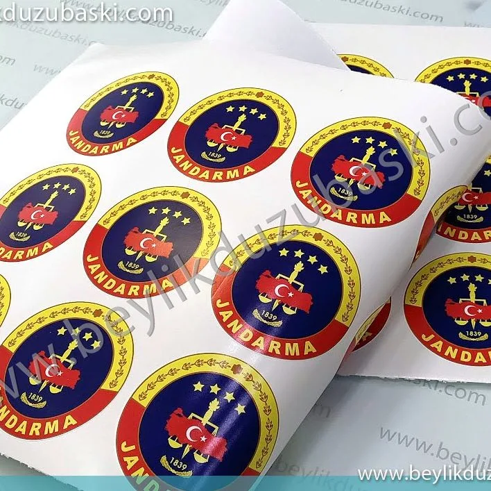 yuvarlak etiket baskı, jandarma için yapılan yuvarlak etiket, acil baskes etiket baskısı, kaliteli etiket imalatı, acil üretim, dış mekan dayanıklı baskes etiket