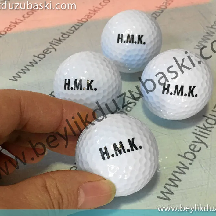 Golf topuna baskı, az adet ürünlere baskı yapılabilir, numune baskı, adetli baskı mümkün, adede göre fiyat alabilirsiniz, golf topunu müşteri temin eder, biz sadece golf topuna baskı yaparız