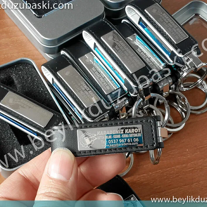 lazer ile, metal USB bellek üzerine baskı, promosyon ürün, deri ve metal usb bellek üzerine, çıkmayan, silinmeyen baskılar, beylikdüzü promosyon baskı merkezi