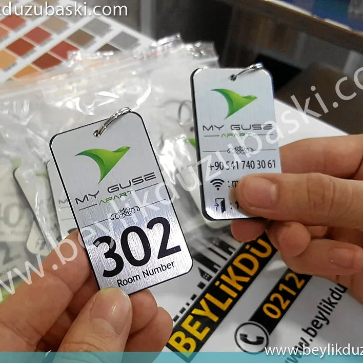Otel için kapı isimliği üretimi, logolu, otele özel, kaliteli ve yıpranmaz ürün, kaliteli, özel üretim, otel anahtarlık, az adet yapılır, 5 mm pleksi, altın ve gümüş renk seçeneği, hızlı üretim, tasarım desteği, otel anahtarlık, özel tasarım anahtarlık, logo ve kapı numarası yazılı, butik otel anahtarlık, kaliteli özel üretim anahtarlık Door name tag production for hotel, logo, hotel-specific, quality and wear-free product, high quality, special production, hotel key chain, few pieces, 5 mm plexiglass, gold and silver color option, fast production, design support, hotel key chain, special design key chain , boutique hotel keychain with logo and door number inscribed, high quality custom made keychain