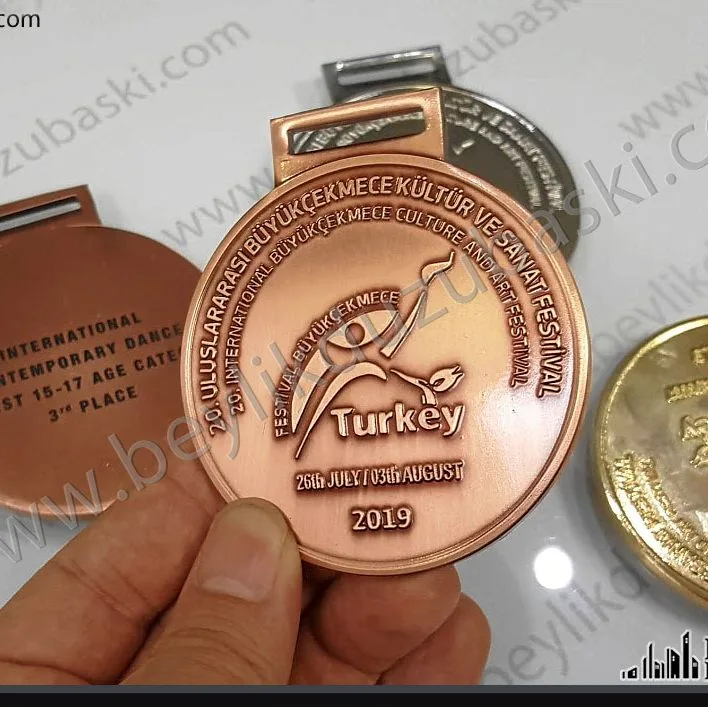madalya imalat, kaliteli madalya baskı, tasarım madalya, adetli üretim olmalı, kalıp bedelleri vardır, özel tasarım, tasarım desteği verilir, kabartmalı madalya