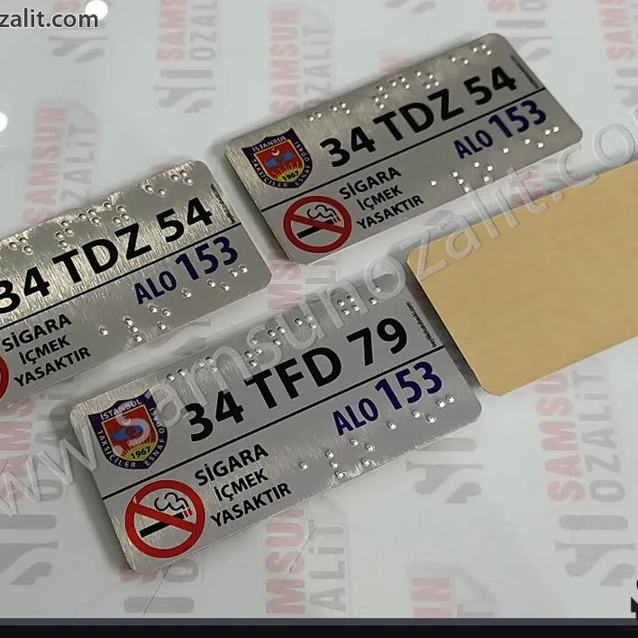 taksi için kabartma plaka, taksi içine kabartma yazı ile plaka yazılması, görme engelli taksi plaka baskısı, silinmeyen, yazıları düşmeyen kaliteli ürün, braille alfabesi, taksi yönetmeliğine uygun, görme özürlü, taksi iç yüzey için plaka baskısı, Ukome yönetmeliğe uygun, büyükşehir yönetmeliğine uygun, kabartma taksi plakası