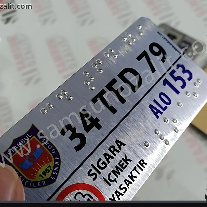 taksi için kabartma plaka, taksi içine kabartma yazı ile plaka yazılması, görme engelli taksi plaka baskısı, silinmeyen, yazıları düşmeyen kaliteli ürün, braille alfabesi, taksi yönetmeliğine uygun, görme özürlü, taksi iç yüzey için plaka baskısı, Ukome yönetmeliğe uygun, büyükşehir yönetmeliğine uygun, kabartma taksi plakası